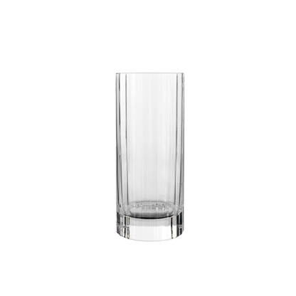 A clear Bach Aperitivo Highball glass by Luigi Bormioli on a white background