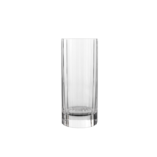 A clear Bach Aperitivo Highball glass by Luigi Bormioli on a white background