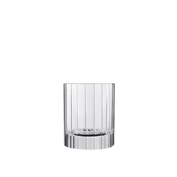 A clear high-tech blown lead-free crystal Bach Water glass with a faceted design, intended for serving beverages.