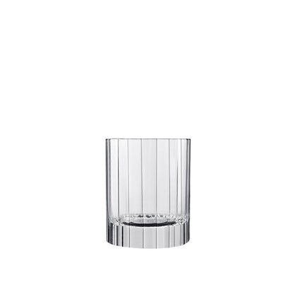 A clear high-tech blown lead-free crystal Bach Water glass with a faceted design, intended for serving beverages.