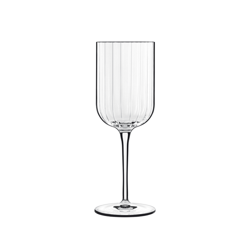 A clear Bach White Wine glass by Luigi Bormioli on a white background