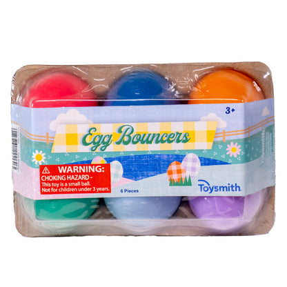 The Toysmith Egg Bouncer 6-pack features colorful toys in a clear plastic carton, ideal for Easter baskets or egg hunts; labeled as a choking hazard and recommended for ages 3+.