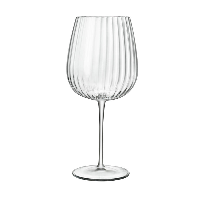 A clear, sophisticated Jenever Gin glass with vertical ridges, featuring a thin stem and flat foot on a white background