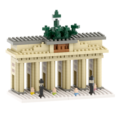 The Brixies Large Gift Box Brandenburg Gate is a micro-brick kit with six columns, a gray roof, green trees on top, and tiny block figures in front, all set on a white base.