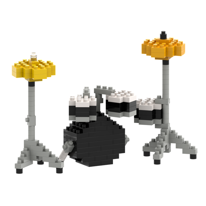 The Brixies Large Zip Bag Drum Kit is a micro-brick drum set with a black and white bass drum, two small toms, and two yellow cymbals on gray stands, all assembled from interlocking plastic bricks.