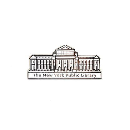 An enamel pin depicting the New York Public Library building in white and black.