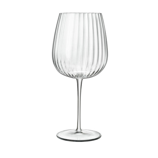 A clear, sophisticated Jenever Gin glass with vertical ridges, featuring a thin stem and flat foot on a white background