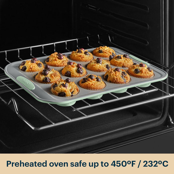 Silicone muffin tray with baked muffins in an oven, preheated up to 450°F/232°C.