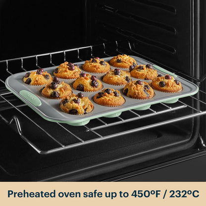 Silicone muffin tray with baked muffins in an oven, preheated up to 450°F/232°C.