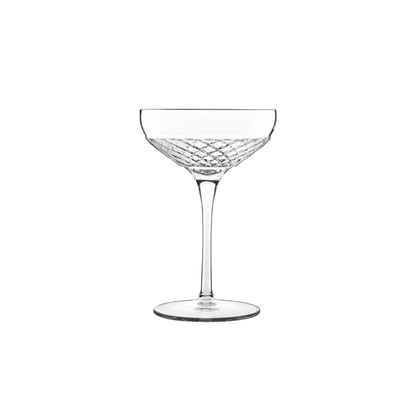 A clear Roma 1960 Cocktail Coupe glass by Luigi Bormioli on a white background