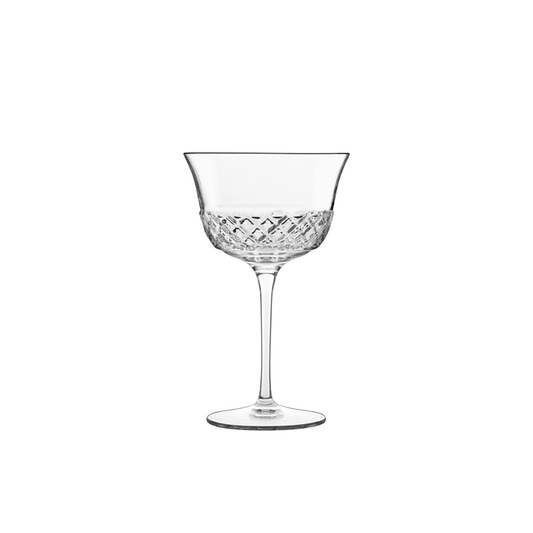 A clear Roma 1960 Fizz glass by Luigi Bormioli on a white background