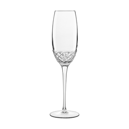 A clear Roma 1960 Flute glass by Luigi Bormioli on a white background