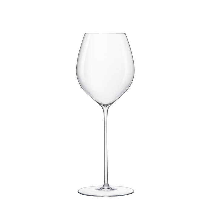 A clear Sapientia Chardonnay glass by Luigi Bormioli on a white background