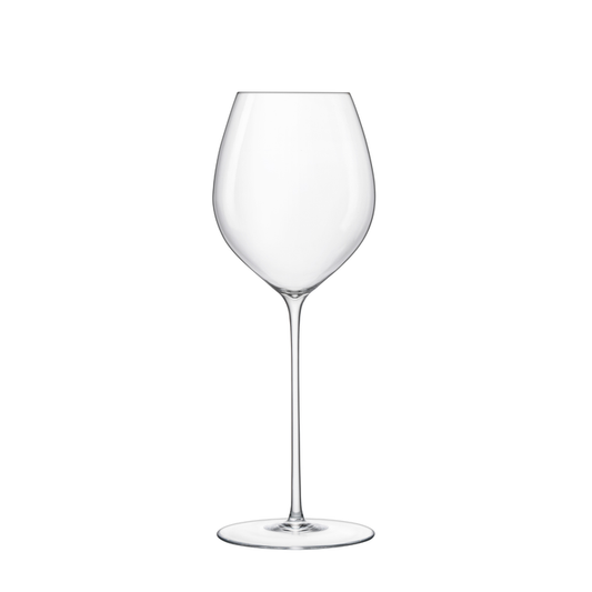A clear Sapientia Chardonnay glass by Luigi Bormioli on a white background