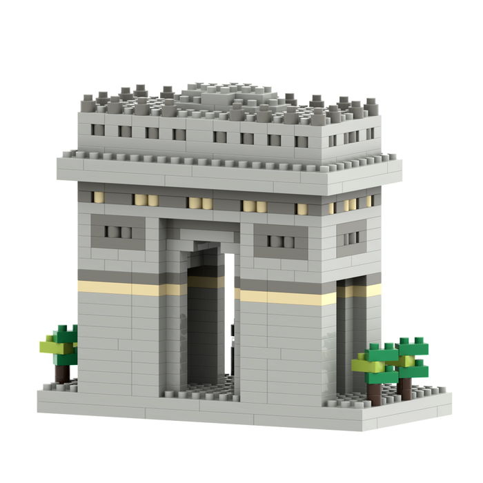 The Brixies Small Gift Box Arc De Triomphe is a micro-brick model of the Paris landmark, featuring a central archway, yellow stripe, and green trees—an elegant tribute constructed from gray bricks.