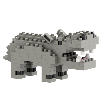The Brixies Small Zip Bag Hippo is a 3D gray hippo figure with white teeth, black eyes, and an open mouth—an ideal collectible building set for animal lovers.