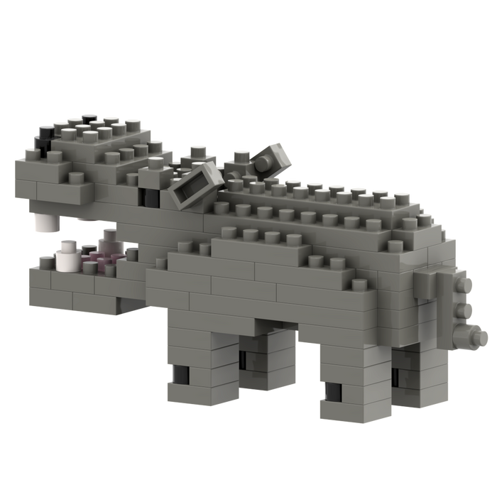 The Brixies Small Zip Bag Hippo is a unique collectible: a 3D hippo figure built from gray interlocking bricks with an open mouth showing white and pink pieces as teeth, set against a plain white background.