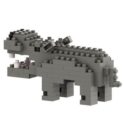 The Brixies Small Zip Bag Hippo is a unique collectible: a 3D hippo figure built from gray interlocking bricks with an open mouth showing white and pink pieces as teeth, set against a plain white background.