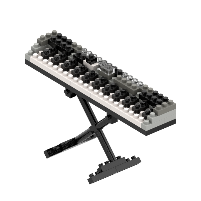 The Brixies Small Zip Bag Keyboard is a micro-brick 3D piano keyboard model with realistic black, white, and gray keys on an X-shaped stand. It comes in a reusable zip storage bag for convenient organization.