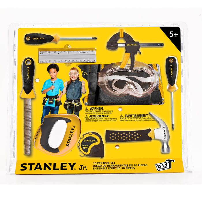 Red Toolbox Stanley Jr. 10 Piece Toolset for ages 5+ includes hammer, screwdriver, saw, tape measure, clamp, file, ruler, safety goggles & tool belt in clear packaging with two children shown.