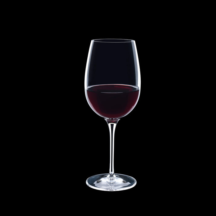 Vinoteque Ricco Red Wine Glass filled with red wine on a black background