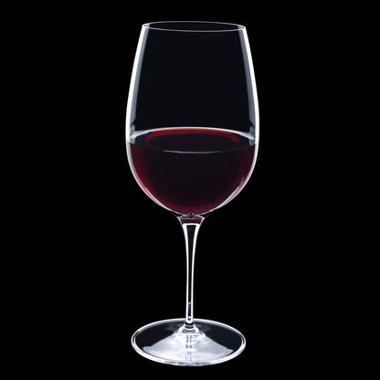 Vinoteque Riserva Red Wine Glass filled with red wine on a black background